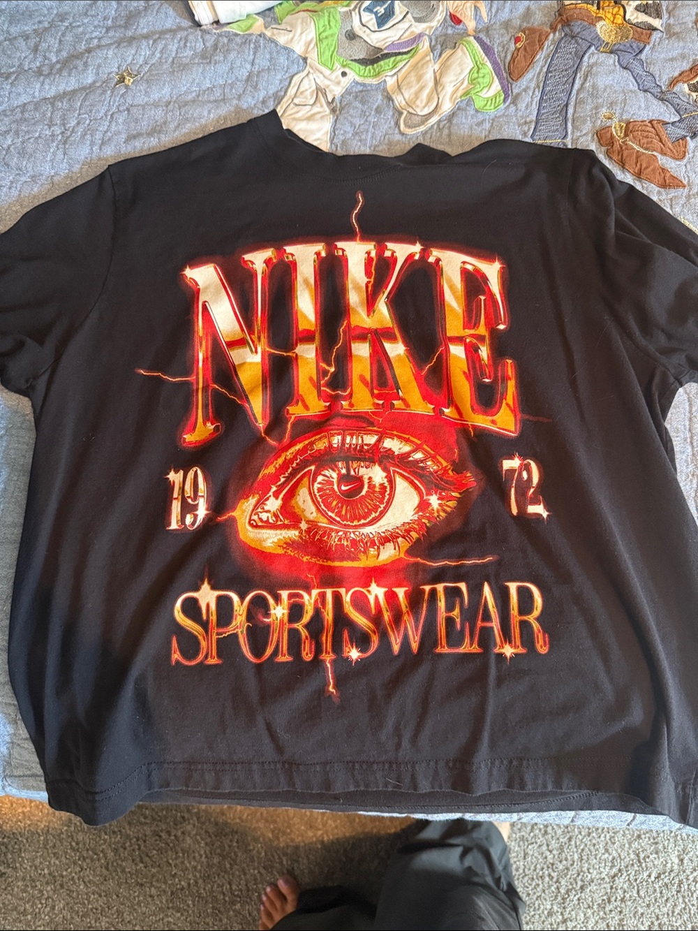 Nike Black Tee with Red-Orange Fiery Eye Graphic